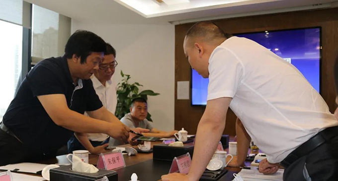 安徽省霍邱縣委副書記程明一行赴中皓股份座談交流